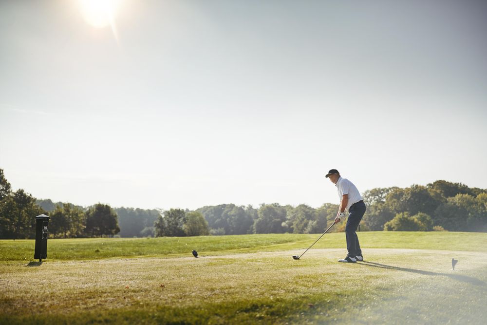 Man playing golf