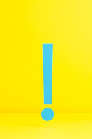 Blue exclamation mark on yellow background
