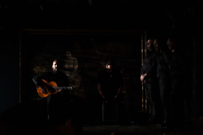 Musicians playing instruments on stage