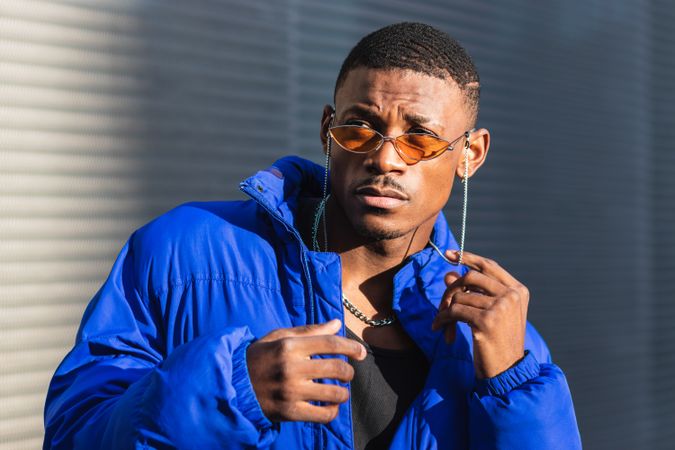 Stylish Black man in sunglasses on street