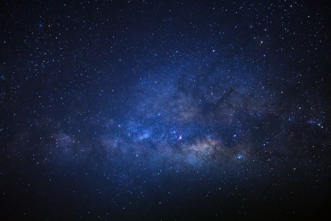 The center of the milky way galaxy with stars and space dust in the universe, Long exposure photograph, with grain