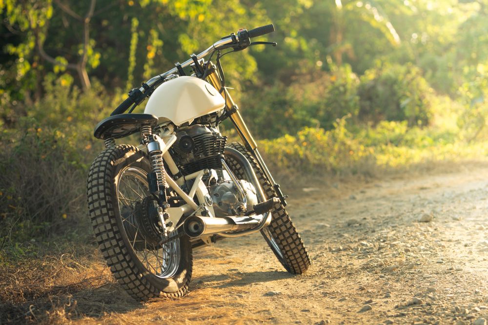 Motorcycle on roadside in countryside