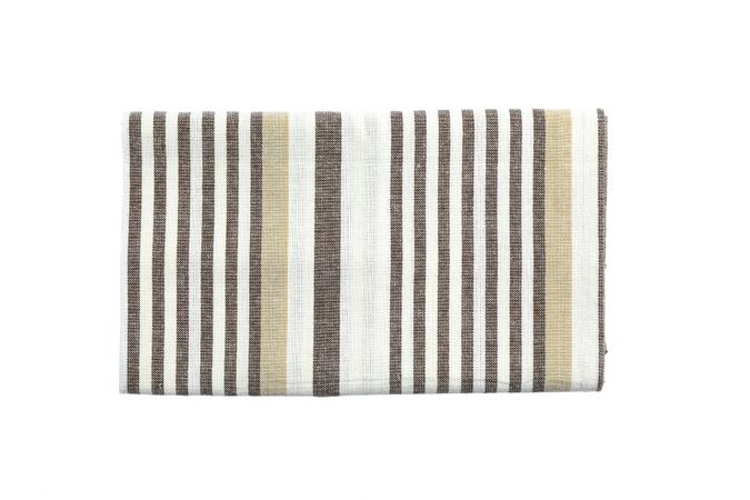 Folded fabric napkin isolated on plain background