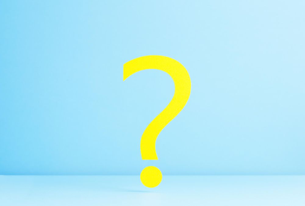Yellow question mark on blue background