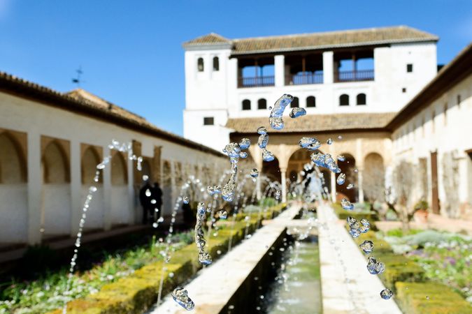 Water splashing in feature of courtyard of the acequia in Generalife, Alhambra, Granada