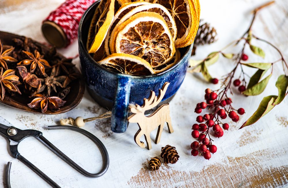 Dried orange slices and anise star spice on table