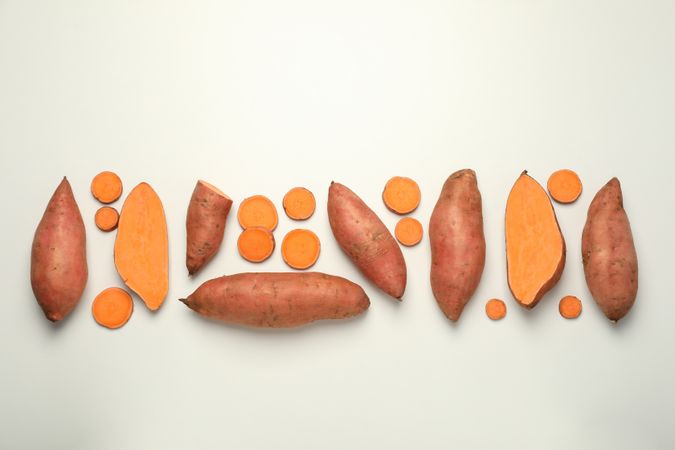 Fresh cut sweet potato on a light background