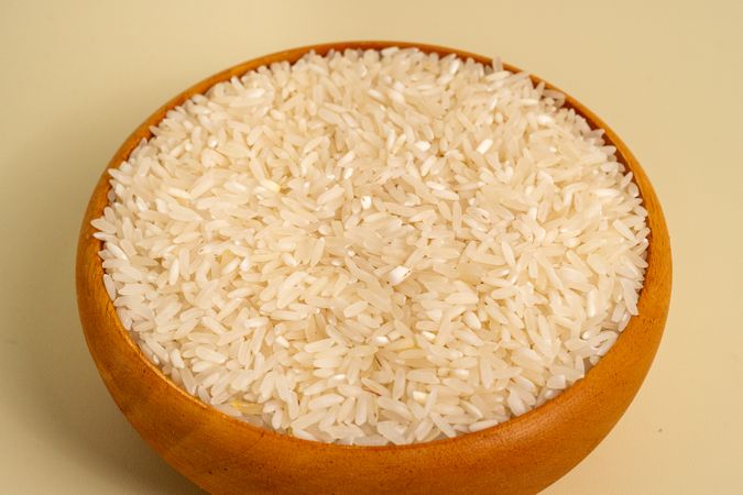 A bowl of rice is sitting on a table