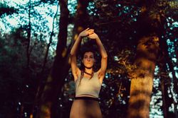 Young woman in majestic forest