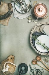 Kitchen appliances with a vintage look on concrete background, vertical composition with copy space
