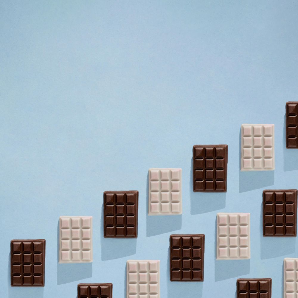 Chocolate bars in rows with copy space
