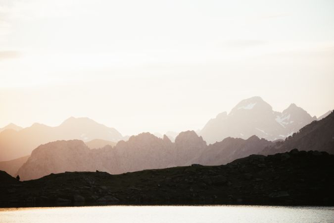 Majestic mountain landscape with human silhouette