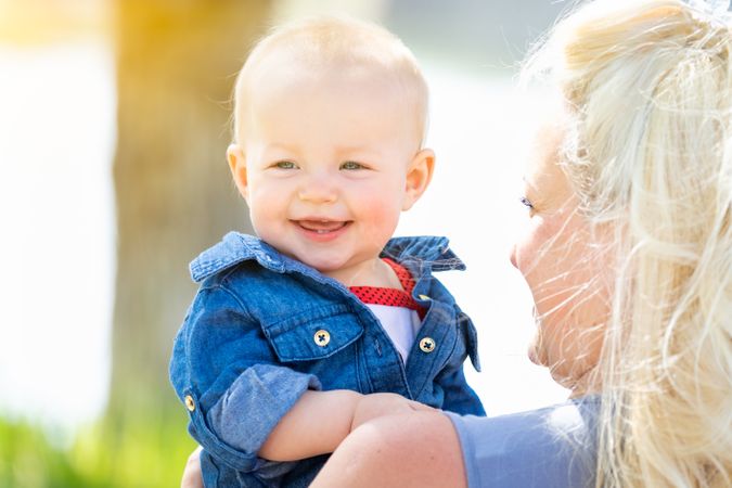 Blonde Mother and Daughter At The Park