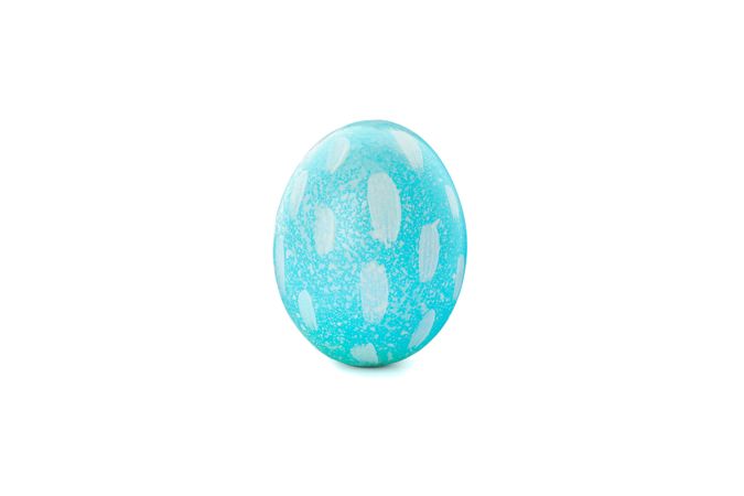 Decorative Easter egg isolated on light background. Festive tradition