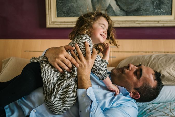 Father playing with daughter