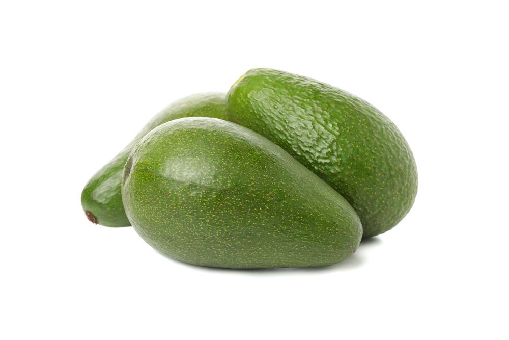 Ripe fresh avocado isolated on plain background