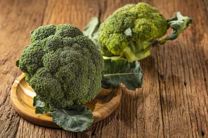 Green organic broccoli on the table.