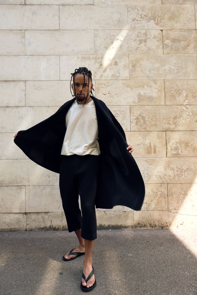 Trendy Black man posing on street