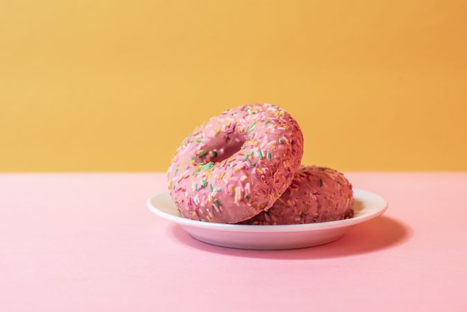 Pink doughnuts in a colorful background