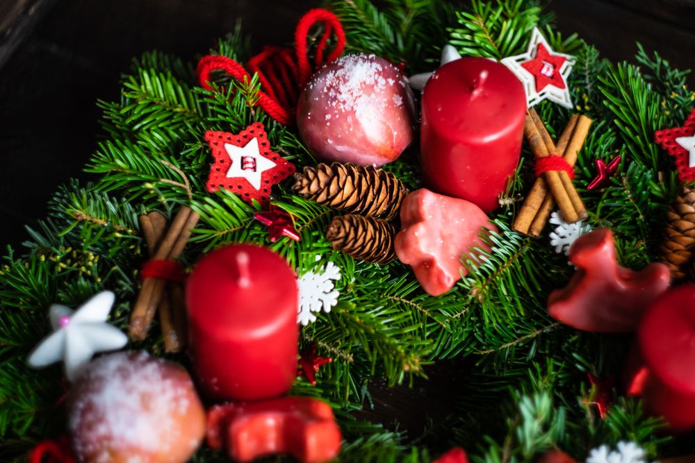 Top view of Christmas wreath with red candles