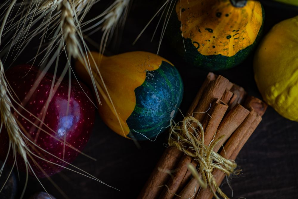 Close up of autumnal foods on wooden table