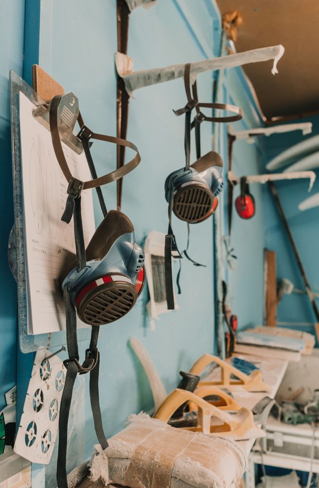 Respirators near different tools in workshop