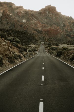 Road in desert to hills