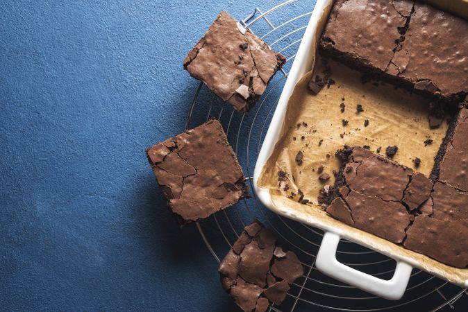Brownies in a pan and on a cooling tray
