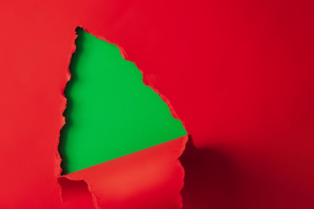 Christmas tree shape made with red and green paper
