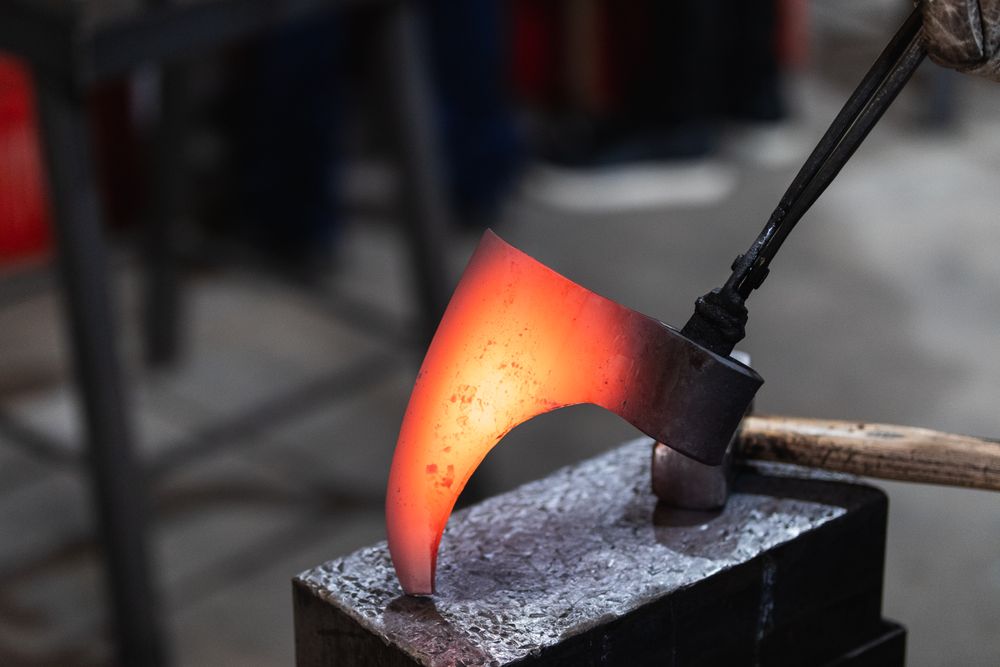 Artisan forging metal axe