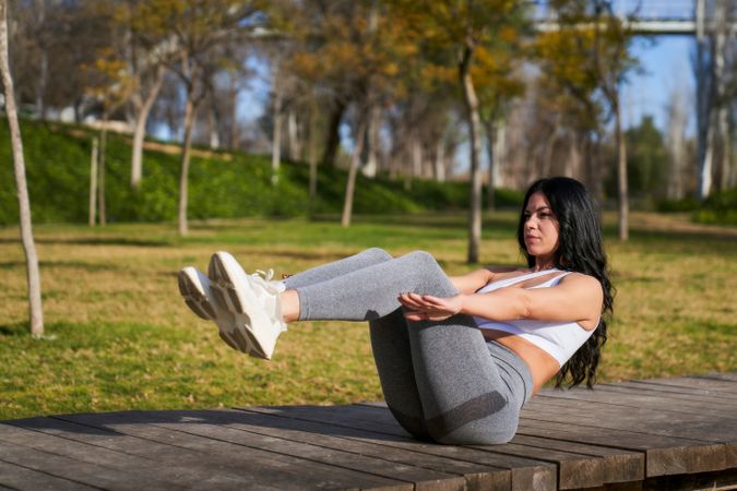 Young athlete doing an abdominal training session