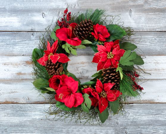 Large Traditional Christmas wreath on vintage wooden planks