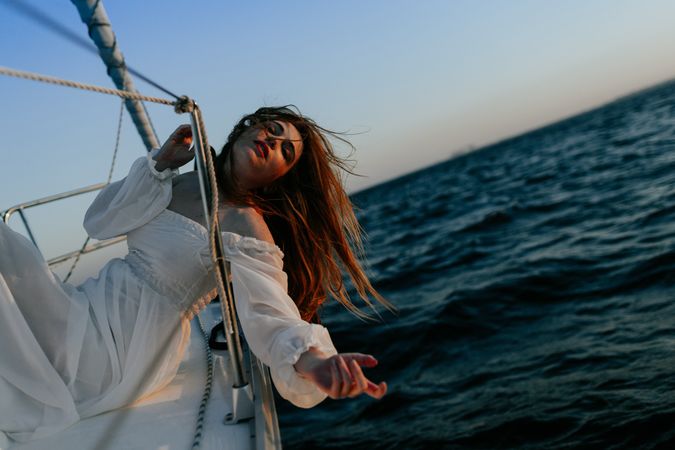 Pretty woman enjoying sea journey