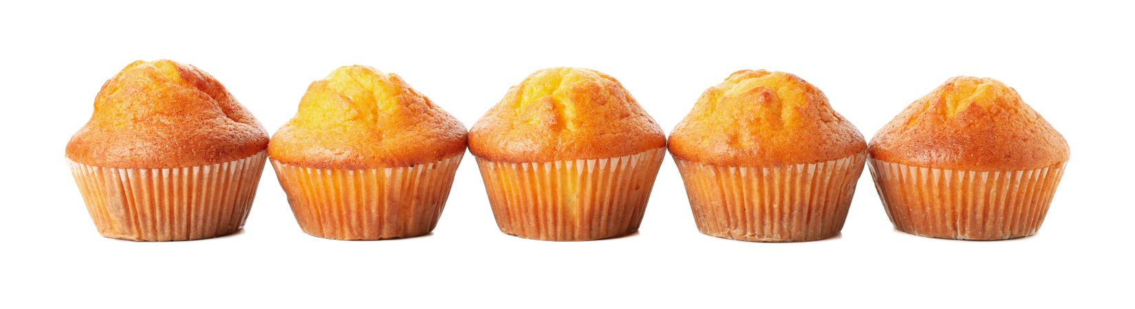 Delicious tasty muffins isolated on light background