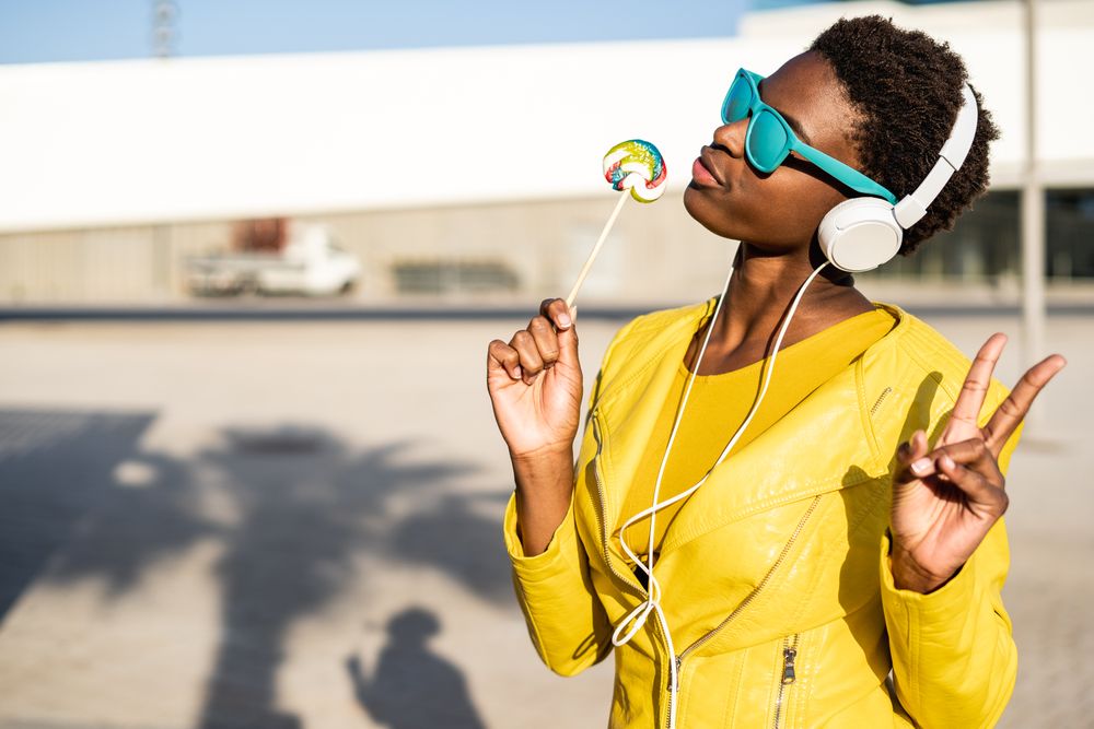 Black woman eating candy