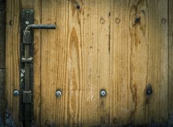 Wooden trap door with iron latch