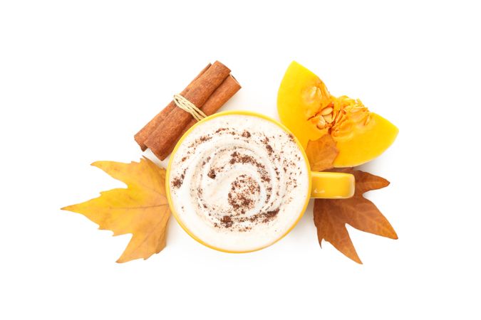 Composition with cup of pumpkin latte isolated on blank background