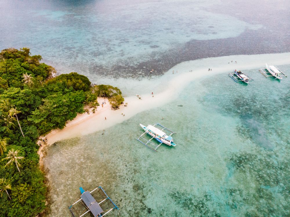 Aerial view of boats near seashore