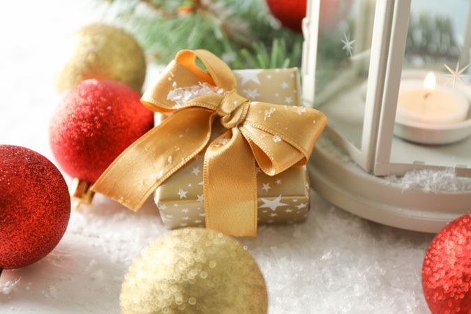 Christmas lantern on decorated background, close up
