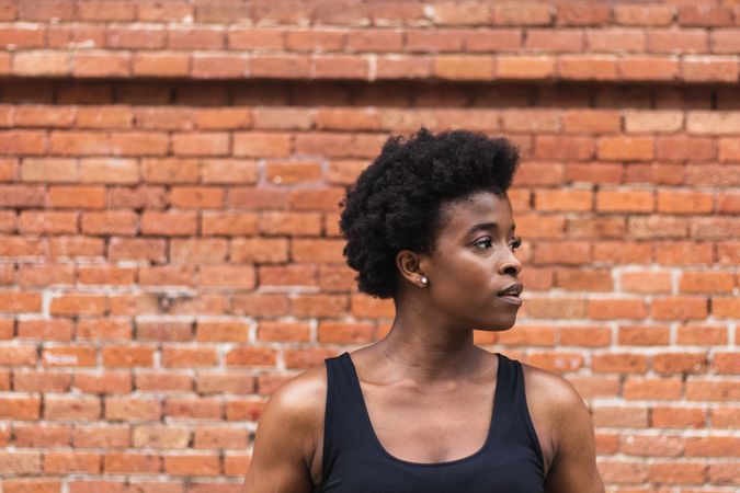 Sad Black woman with Afro hairstyle looking away