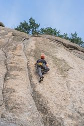 Man climbing a rock