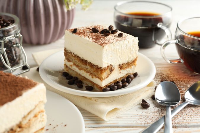 Composition with tasty tiramisu on wooden background. Delicious dessert