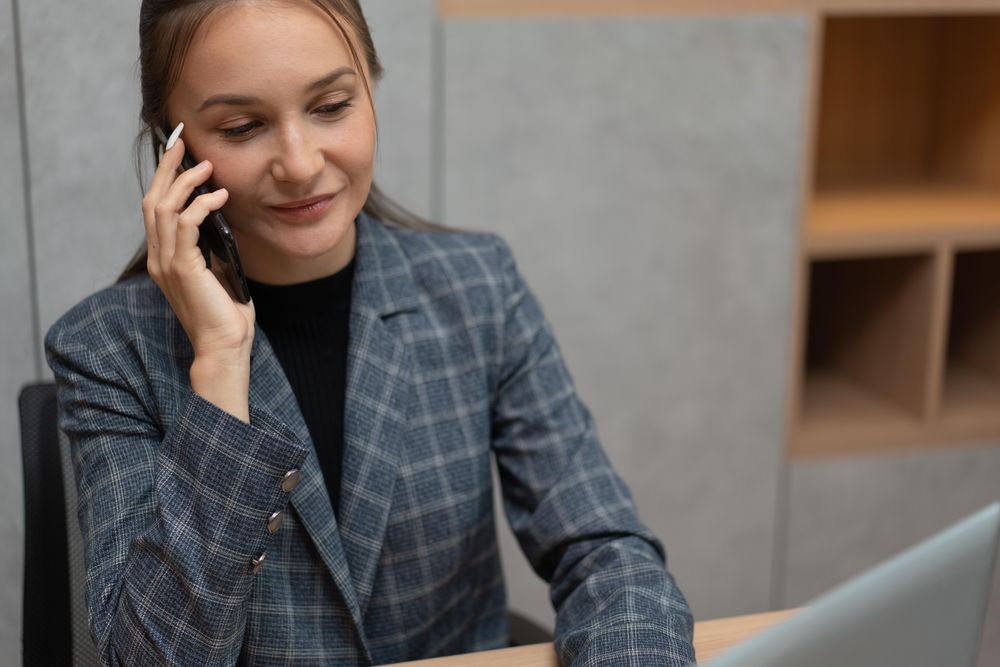 Female employee talking on the phone