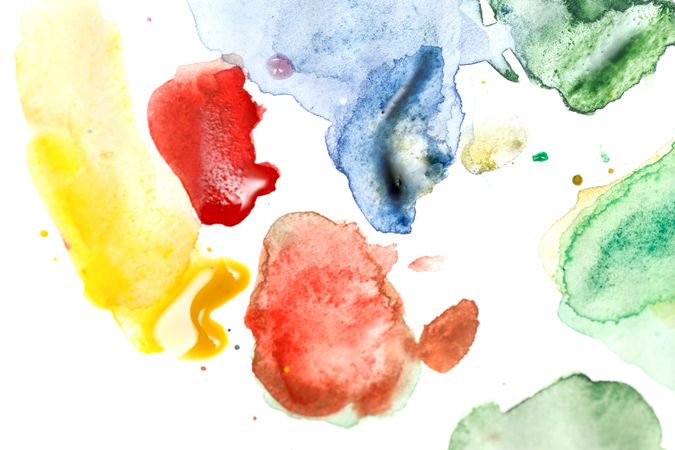 Watercolor drops of paint on paper with bright colors