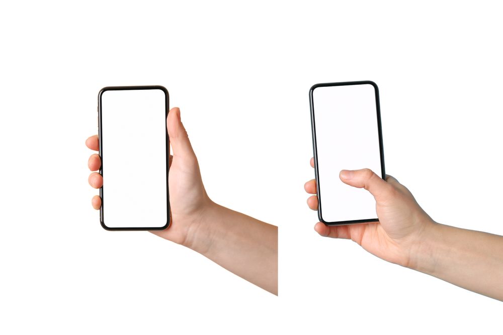 Hands display a modern smartphone with a clean, blank screen
