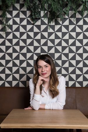 Young woman sitting at cafe