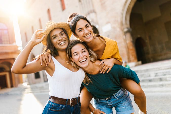 Multi-ethnic group of three happy women having fun on summer vacation