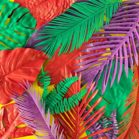 Painted tropical and palm leaves in vibrant bold colors