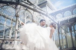 Newly weds having fun near vintage building