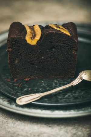 Slice of dark chocolate banana bread cake